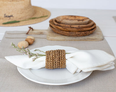 Linen napkins and woven napkin rings from Artha Collections
