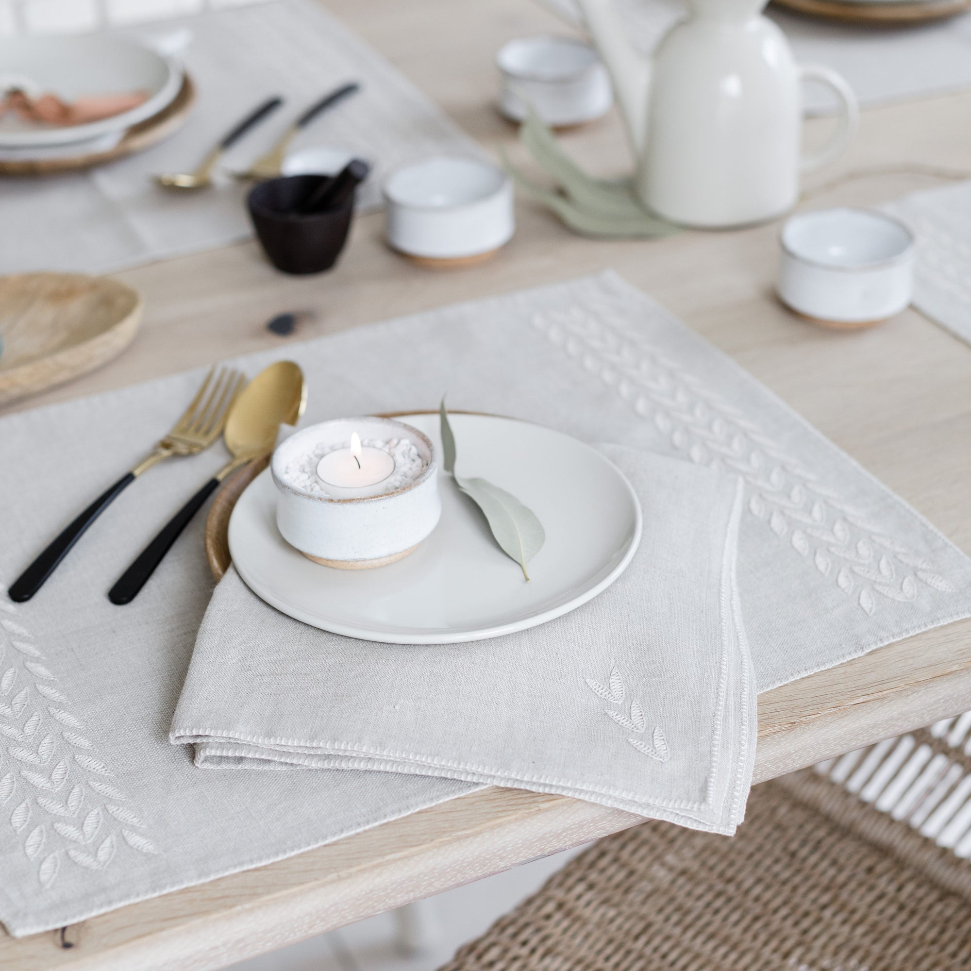 Beige linen placemat hand embroidered petal design by artha collections