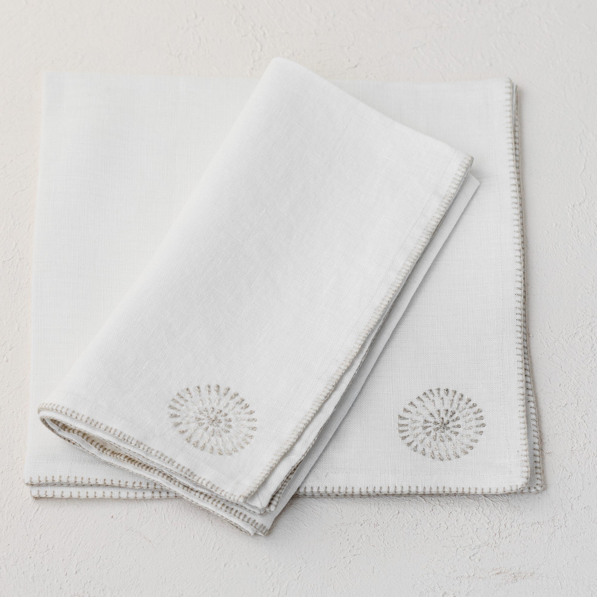 Cream linen hand embroidered napkin set by artha collections