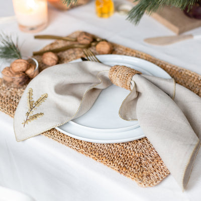 beige linen napkin with napkin ring by artha collections