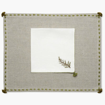 Beige linen placemat with hand embroidered border design in sage green from artha collections. With matching cream linen napkin