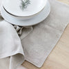 Table setting with hand embroidered linens from Artha Collections
