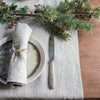 Christmas table setting with greenery and  table runner by artha collections