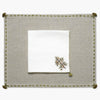 Beige linen placemat to match cream linen napkin with christmas tree motif from artha collections