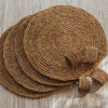 Round handwoven banana fiber placemat and napkin ring set of 4 from artha collections