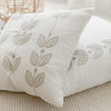 Hand embroidered cream line pillow sets. Green with tan from artha collections